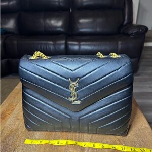 Black Quilted Shoulder Bag with Gold Accents; No Brand